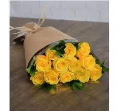 yellow roses wrapped